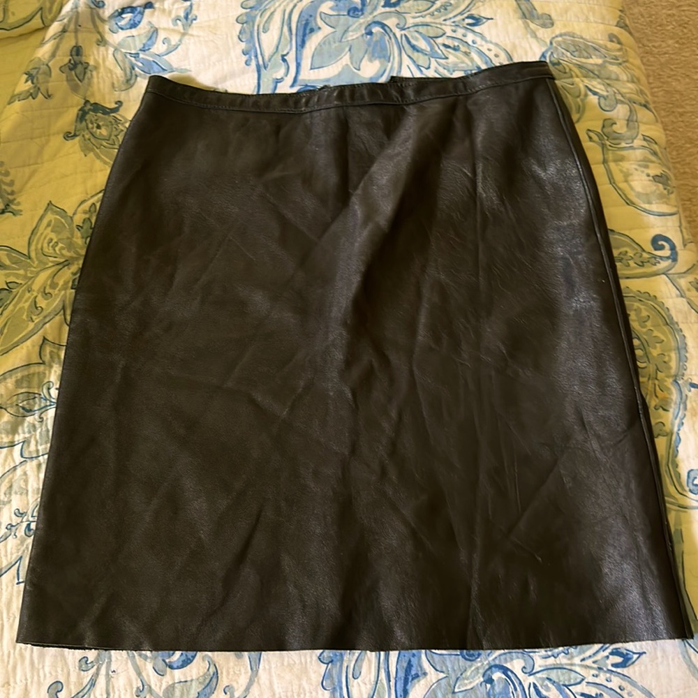 Buttery soft excellent condition black 100% leather.  Size 8. Purple label.